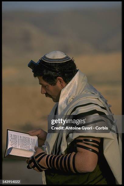 Soldier in prayer during the manoeuvres.