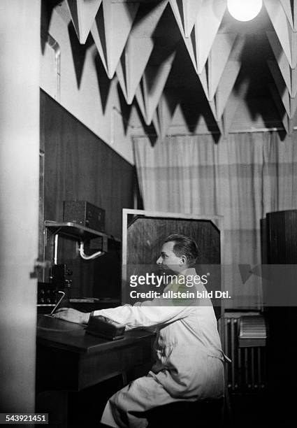 German Empire Free State Prussia East Prussia Province Berlin: Radio station ' Reichssender Koenigsberg ' - radio engineer in the studio -...