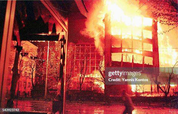 Building ablaze after the NATO bombing.