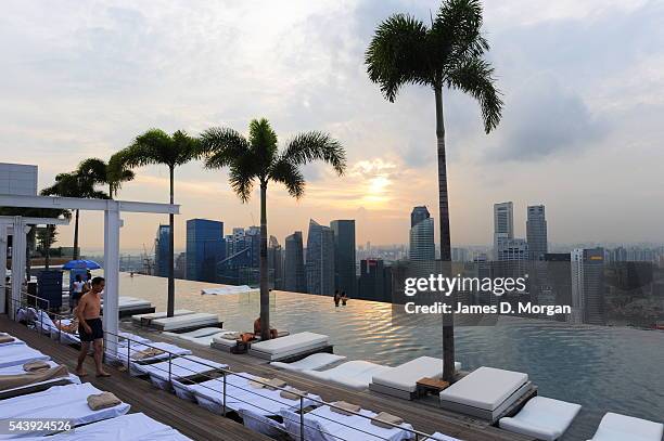 Marina Bay Sands hotel and resort on March 08, 2011 in Singapore. The newest attraction in Singapore, the resort of the Marina Bay Sands, cost a...