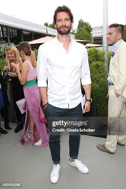 Arne Friedrich arrives to the 'Designer for Tomorrow' during the Mercedes-Benz Fashion Week Berlin Spring/Summer 2017 at Erika Hess Eisstadion on...