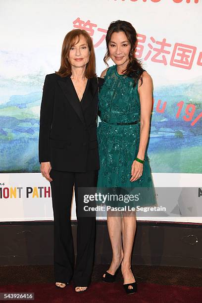 Isabelle Huppert and Michelle Yeoh attend the 6th Chinese Film Festival : Photocall at Cinema Gaumont Marignan on June 30, 2016 in Paris, France.