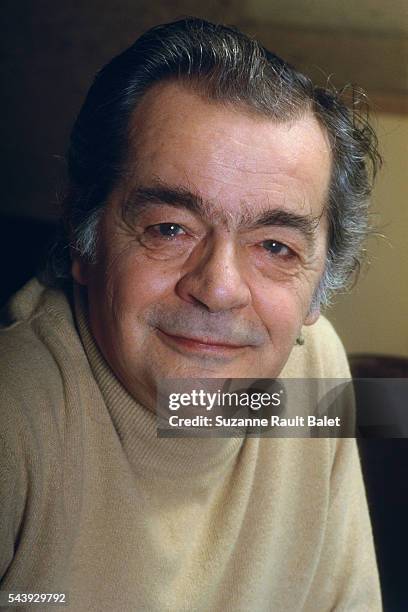 French singer and actor Serge Reggiani at home.