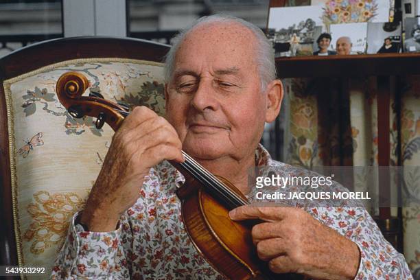 French Violonist Stephane Grappelli at home.