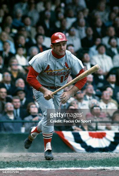Tim McCarver of the St. Louis Cardinals bats against the Detroit Tigers during the 1968 World Series in October 1968, at Tiger Stadium in Detroit,...