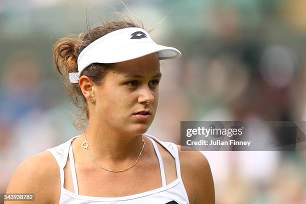 Jana Cepelova of Slovakia looks on during the Ladies Singles second round match against Gabrine Muguruza of Spain on day four of the Wimbledon Lawn...