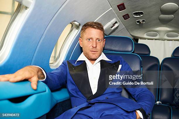 Lapo Elkann posing with the Learjet 31 'Nel Blu Dipinto Di Blu’ unveiled At Linate SEA Prime on June 27, 2016 in Milan, Italy.
