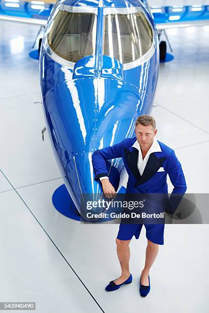 Lapo Elkann posing with the Learjet 31 'Nel Blu Dipinto Di Blu’ unveiled At Linate SEA Prime on June 27, 2016 in Milan, Italy.