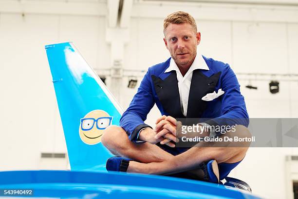 Lapo Elkann posing with the Learjet 31 'Nel Blu Dipinto Di Blu’ unveiled At Linate SEA Prime on June 27, 2016 in Milan, Italy.