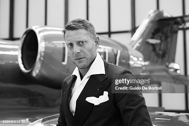 Lapo Elkann posing with the Learjet 31 'Nel Blu Dipinto Di Blu’ unveiled At Linate SEA Prime on June 27, 2016 in Milan, Italy.