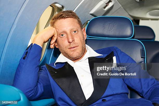 Lapo Elkann posing with the Learjet 31 'Nel Blu Dipinto Di Blu’ unveiled At Linate SEA Prime on June 27, 2016 in Milan, Italy.