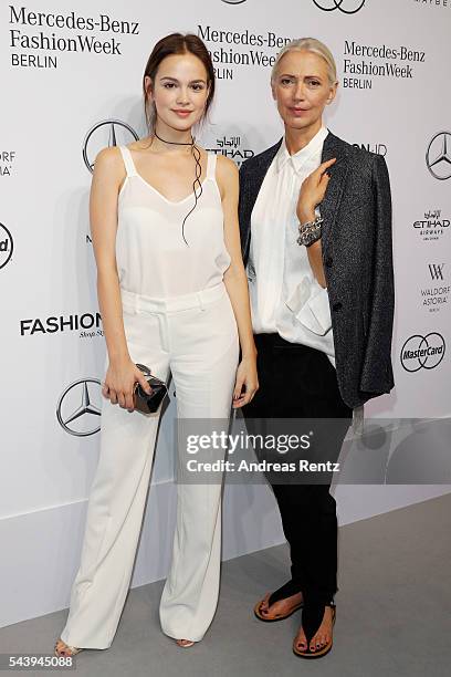 Emilia Schuele , dressed by Peek & Cloppenburg, and Christiane Arp attend the 'Designer for Tomorrow' show during the Mercedes-Benz Fashion Week...