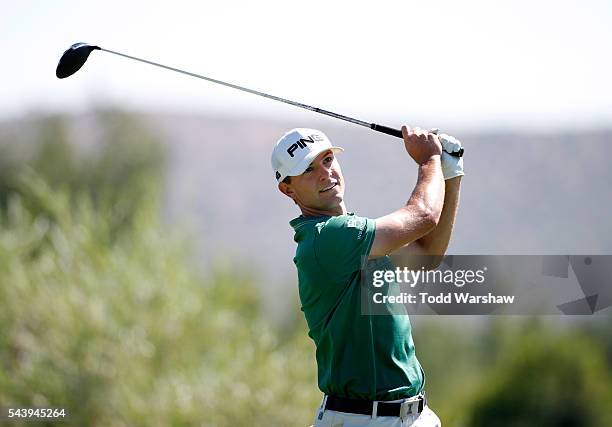 Luke Guthrie plays his shot from the second tee during the first round of the Barracuda Championship at the Montreux Golf and Country Club on June...