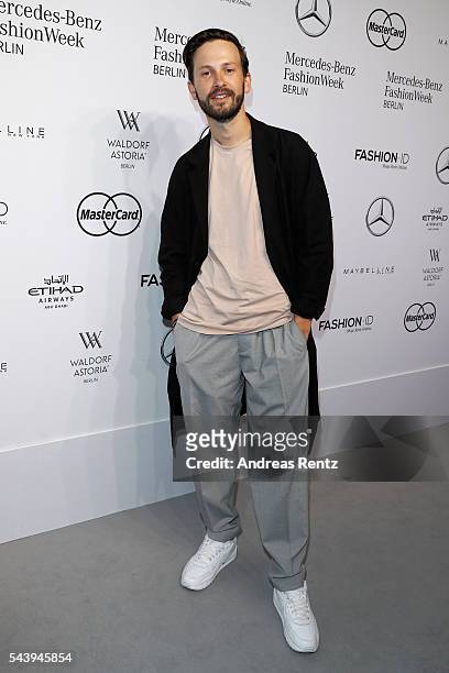 Franz Dinda attends the 'Designer for Tomorrow' show during the Mercedes-Benz Fashion Week Berlin Spring/Summer 2017 at Erika Hess Eisstadion on June...