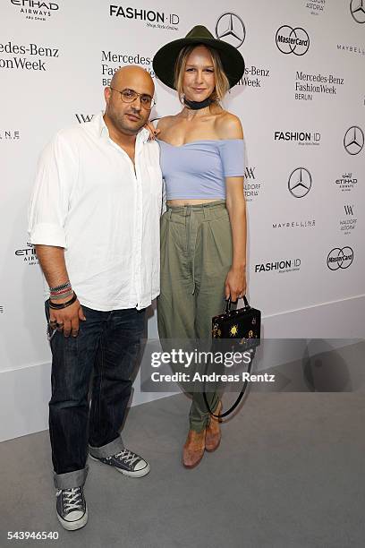 Davis Hason and Esther Seibt attend the 'Designer for Tomorrow' show during the Mercedes-Benz Fashion Week Berlin Spring/Summer 2017 at Erika Hess...