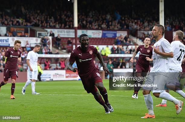 Prince Buaben of Hearts celebrates scoring from the penalty spot during the UEFA Europa League First Qualifying Round match between Heart of...