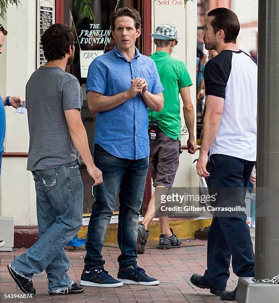 Actors Charlie Day, Glenn Howerton and Rob McElhenney are seen filming scenes of season 12 of It's Always Sunny In Philadelphia sitcom in...