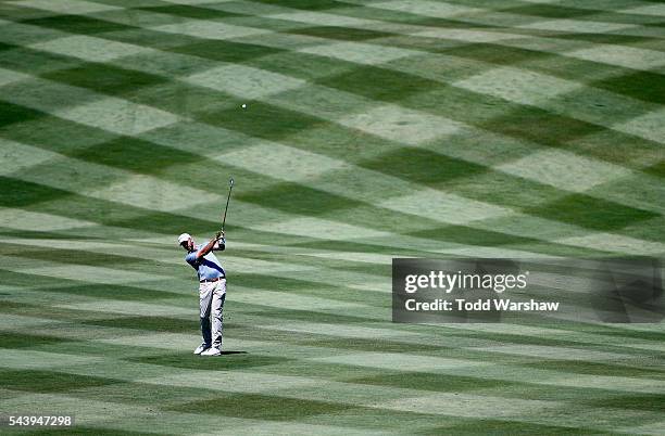 Geoff Ogilvy of Australia plays his shot on the first fairway during the first round of the Barracuda Championship at the Montreux Golf and Country...