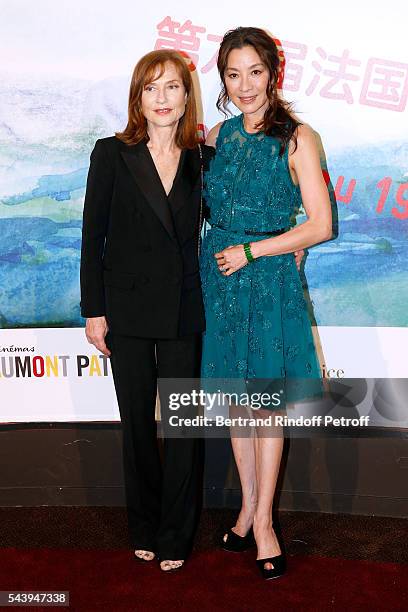 Actresses Isabelle Huppert and Michelle Yeoh attend the 6th Chinese Film Festival : Photocall at Cinema Gaumont Marignan on June 30, 2016 in Paris,...