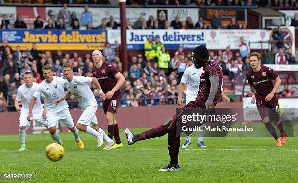 Prince Buaben of Hearts scores from the penalty spot during the UEFA Europa League First Qualifying Round match between Heart of Midlothian FC and FC...