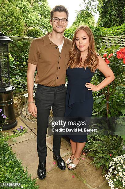 Jim Chapman and Tanya Burr attend an intimate dinner hosted by Tanya Burr to launch her first cookbook 'Tanya Bakes' at Number Sixteen on June 30,...