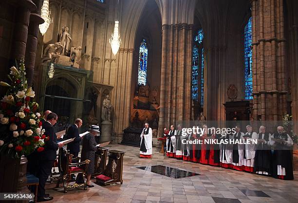 Britain's Queen Elizabeth II and Britain's Prince Philip, Duke of Edinburgh attend a Service on the Eve of the Centenary of the Battle of the Somme...