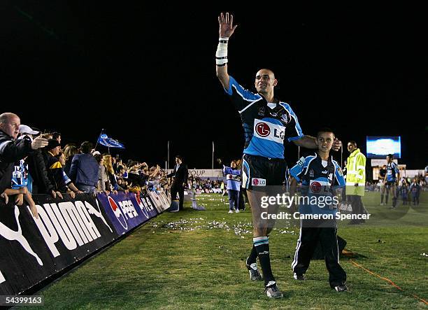 David Peachey of the Sharks farwells the crowd after playing his last home match, the Round 26 NRL match between the Cronulla Sutherland Sharks and...