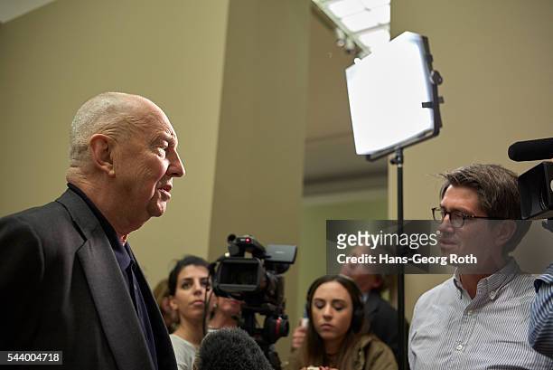 Georg Baselitz speaks at a TV interview during the preview of the exhibition 'Georg Baselitz. Die Helden' at Staedel Museum on June 29, 2016 in...