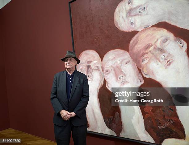 Georg Baselitz poses in front of the masterpiece 'Heads' during the preview of the exhibition 'Georg Baselitz. Die Helden' at Staedel Museum on June...