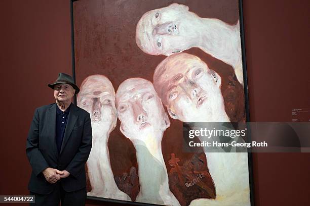 Georg Baselitz poses in front of the masterpiece 'Heads' during the preview of the exhibition 'Georg Baselitz. Die Helden' at Staedel Museum on June...