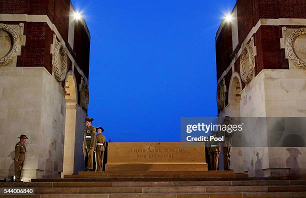 Soldiers take part in a vigil at the the Stone of Remembrance on June 30, 2016 in Thiepval, France. The event is part of the Commemoration of the...