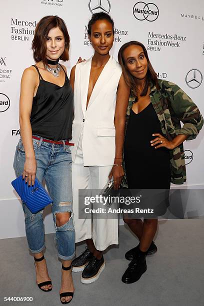 Lena Meyer-Landrut, Sara Nuru and Hadnet Tesfai attend the 'Designer for Tomorrow' show during the Mercedes-Benz Fashion Week Berlin Spring/Summer...