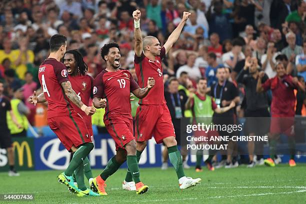 Portugal's defender Fonte , Portugal's midfielder Renato Sanches , Portugal's defender Eliseu and Portugal's defender Pepe celebrate after winning...