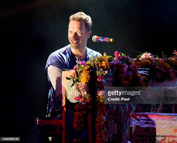 Chris Martin of Coldplay performs during the Sentebale Concert at Kensington Palace on June 28, 2016 in London, England.