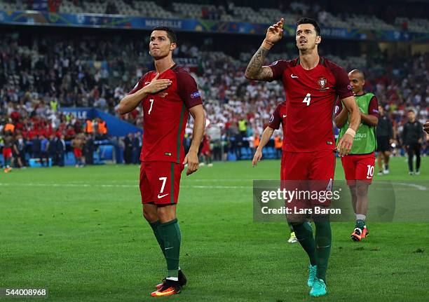 Cristiano Ronaldo and Jose Fonte of Portugal celebrate their team's win after the UEFA EURO 2016 quarter final match between Poland and Portugal at...