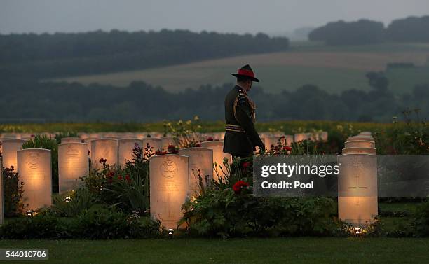 Member of Military personnel looks a war graves during part of a military-led vigil to commemorate the 100th anniversary of the beginning of the...