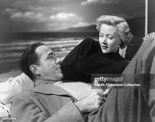 Actors Humphrey Bogart and Gloria Grahame pose for a publicity still for the Columbia Pictures film 'In a Lonely Place' in 1950 in Los Angeles,...