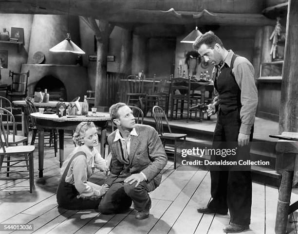 Actors Humphrey Bogart, Bette Davis and Leslie Howard pose for a publicity still for the Warner Bros film 'The Petrified Forest' in 1936 in Los...