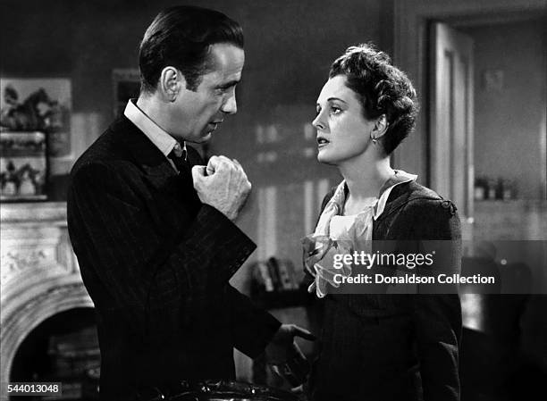 Actors Humphrey Bogart and Mary Astor pose for a publicity still for the Warner Bros film 'The Maltese Falcon' in 1941 in Los Angeles, California.