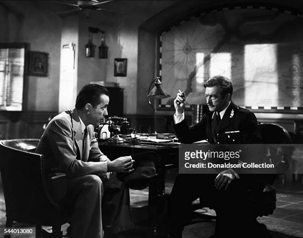 Actors Humphrey Bogart and Claude Rains pose for a publicity still for the Warner Bros film 'Casablanca' in 1942 in Los Angeles, California.