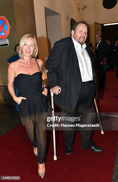 Actor Ottfried Fischer and his partner Simone Brandlmeier attend the Bernhard Wicki Award during the Munich Film Festival 2016 at Cuvilles Theatre on...