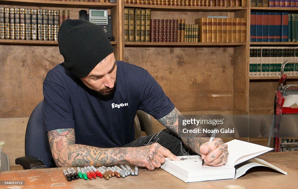 Travis Barker Signs Copies Of "Can I Say: Living Large, Cheating Death, and Drums, Drums, Drums"