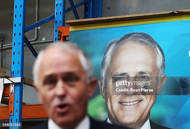 Prime Minister Malcolm Turnbull addresses supporters at Robotic Automation in Newington as he campaigns in the electorate of Reid on July 1, 2016 in...