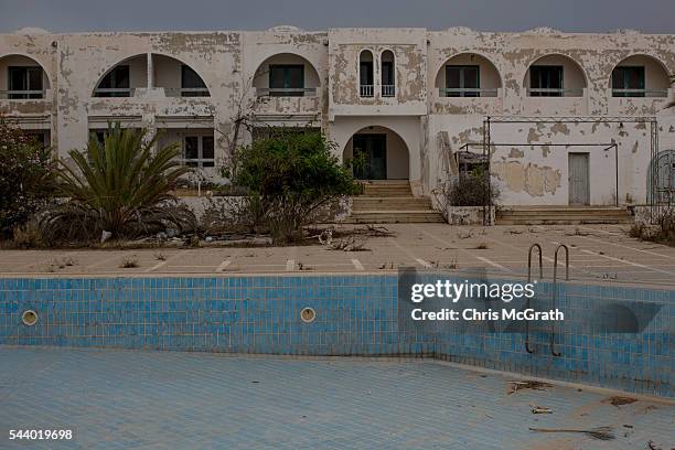General view of an abandoned hotel on June 30, 2016 in Djerba, Tunisia. Before the 2011 revolution, tourism in Tunisia accounted for approximately 7%...