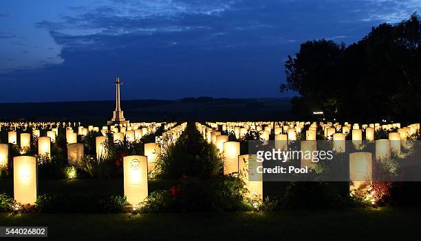 View of military graves illuminated during part of a military-led vigil to commemorate the 100th anniversary of the beginning of the Battle of the...