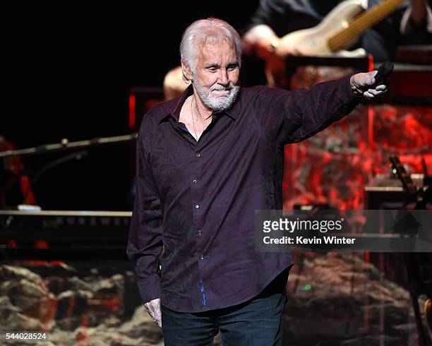 Singer Kenny Rogers performs onstage during his final world tour "The Gambler's Last Deal" at the Civic Arts Plaza on June 30, 2016 in Thousand Oaks,...