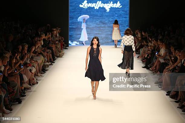 The photo shows Models with the collection of Lena Hoschek on the catwalk in the Erika Hess Ice Stadium in Berlin-Weding. The 19th time, the...