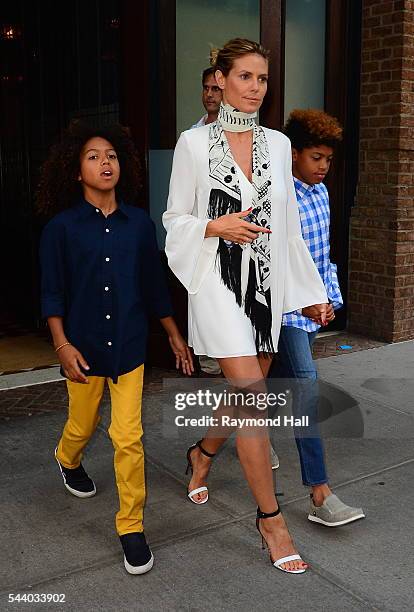 Heidi Klum and children Johan Samuel and Henry Samuel are seen in Soho on June 30, 2016 in New York City.