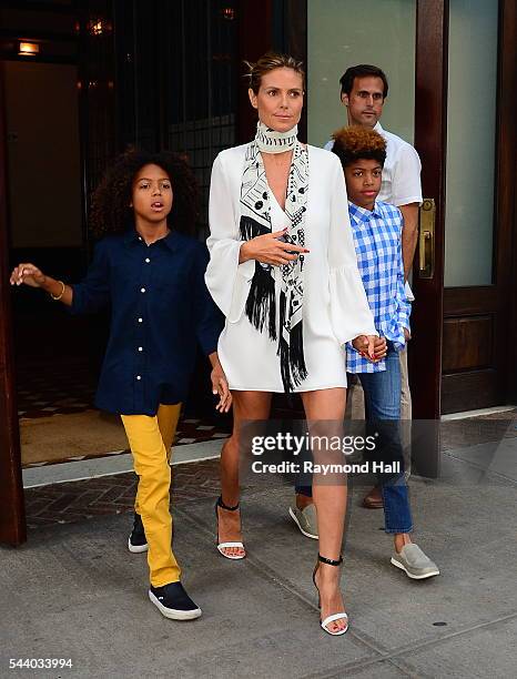 Heidi Klum and children Johan Samuel and Henry Samuel are seen in Soho on June 30, 2016 in New York City.