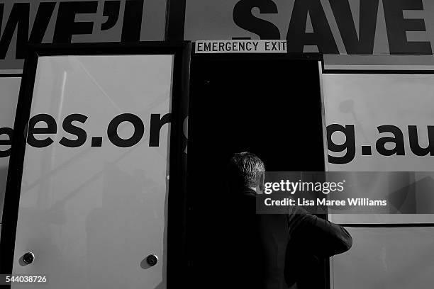 Image has been shot in black and white, no colour version available.) Opposition Leader, Australian Labor Party Bill Shorten boards the campaign bus...